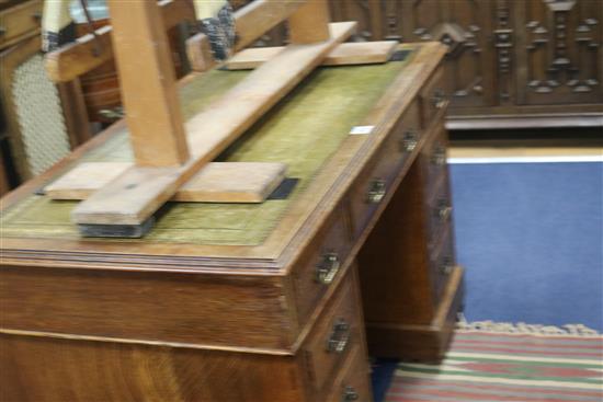 An Edwardian oak pedestal desk, W.122cm